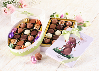 Praline-Eier und Dosen